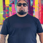 Artist F. Garcia at the Art Collective Gallery in Rogers AR